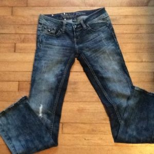 Distressed boot cut jeans